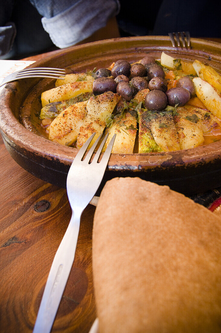 Tajine with bread and olives, oasis, Morocco, North Africa, Africa