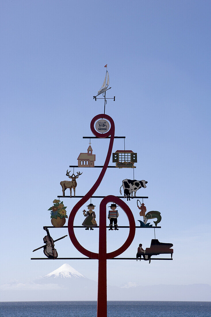 Musical Tree Sculpture at Lago Llanquihue lake with view of Osorno Volcano, Frutillar, Los Lagos, Patagonia, Chile, South America, America