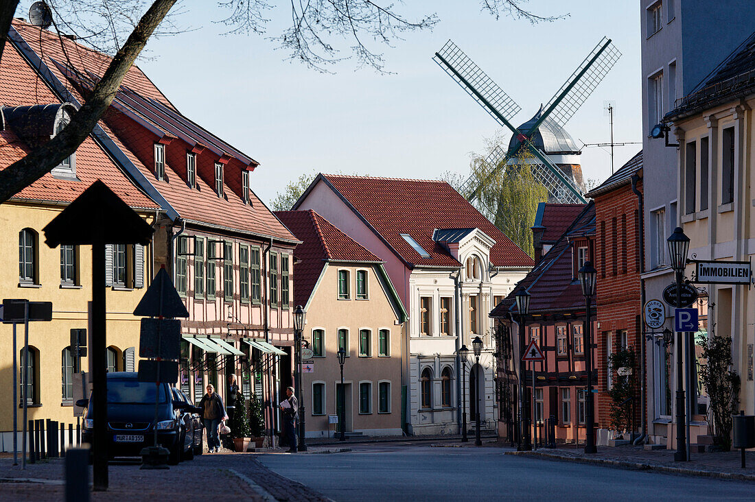 High street with view towards the Windmill in Roebel, Mecklenburg lake District, Mecklenburg-Western Pomerania, Germany