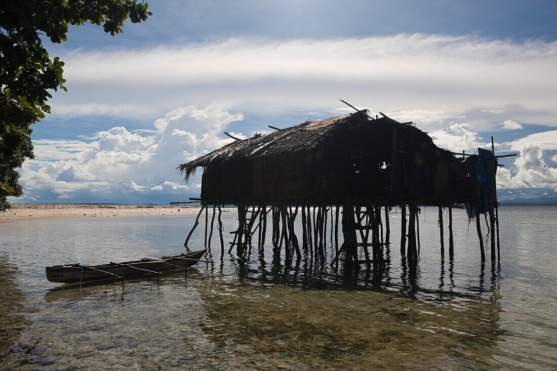 House on Stilts on Island near Sorong, Raja Ampat, West Papua, Indonesia