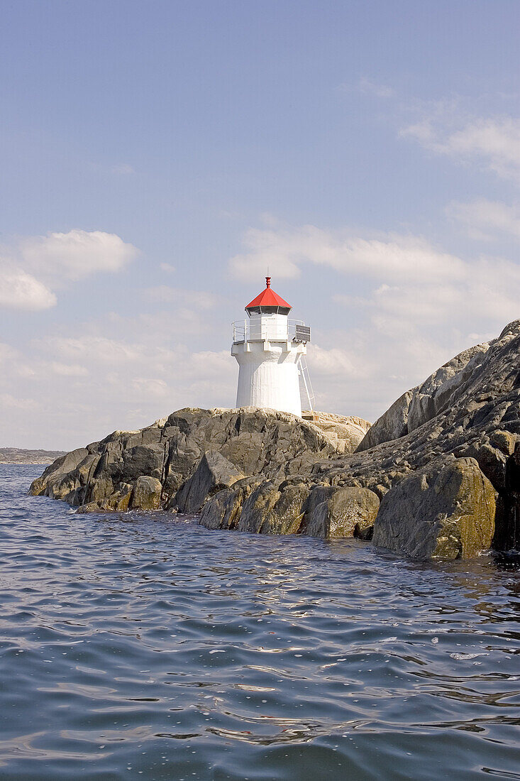 Lighthouse at rocky coast