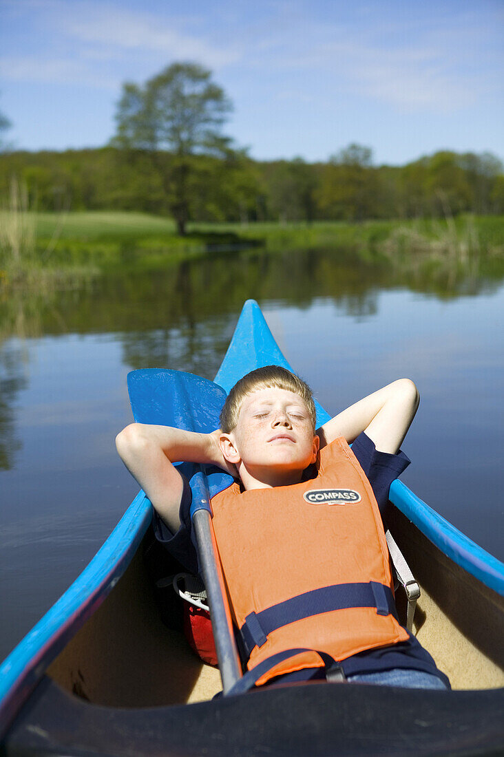 Paddle a canoe, Rönneå, Skåne, Sweden