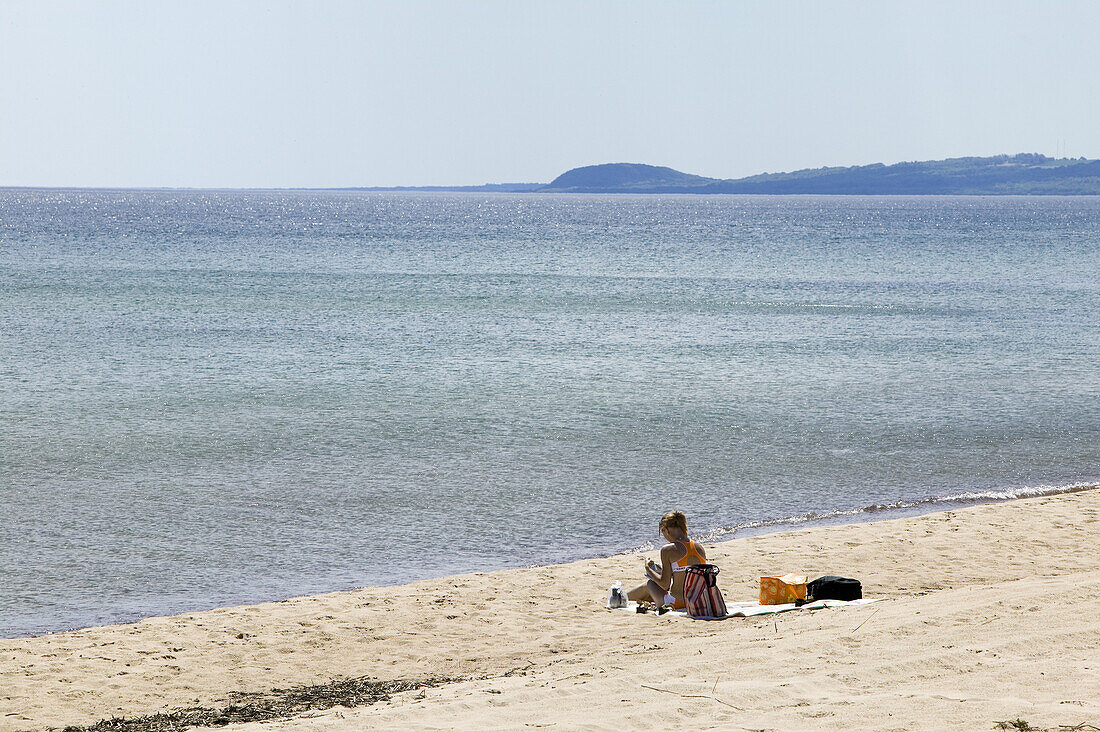 Woman on the beach, Skane, Sweden