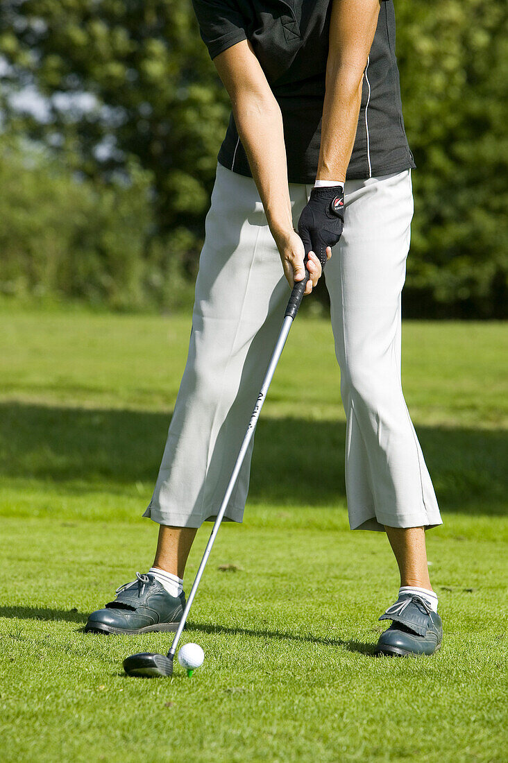 Woman is playing golf