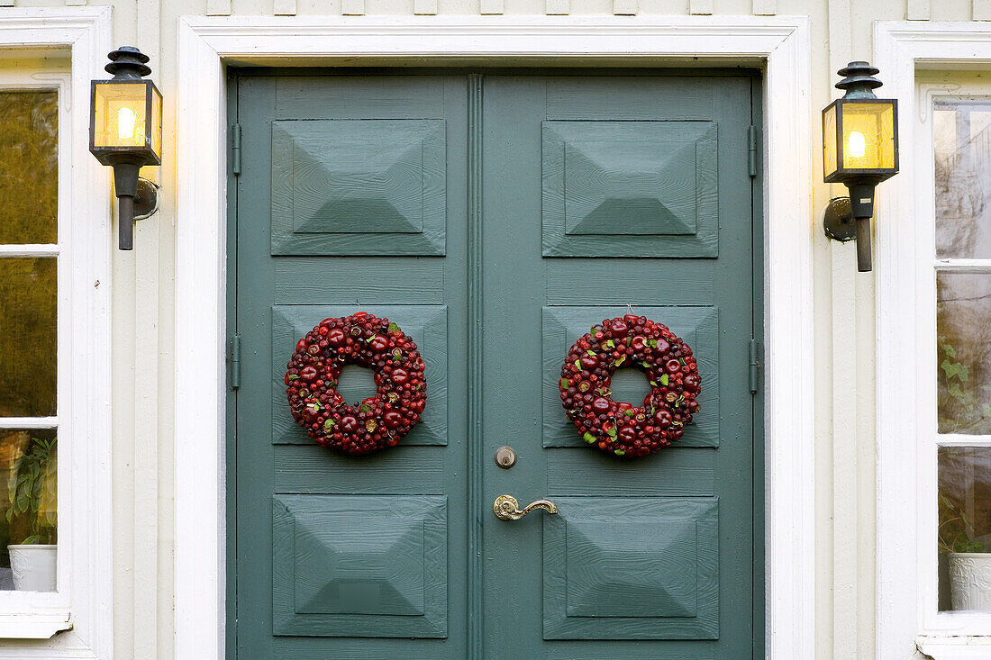 Blue doors with wreath
