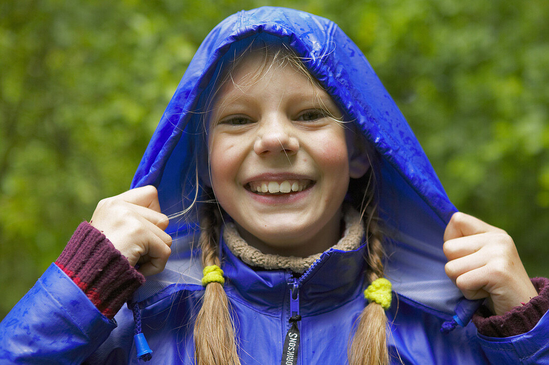 Girl in blue rainjacket