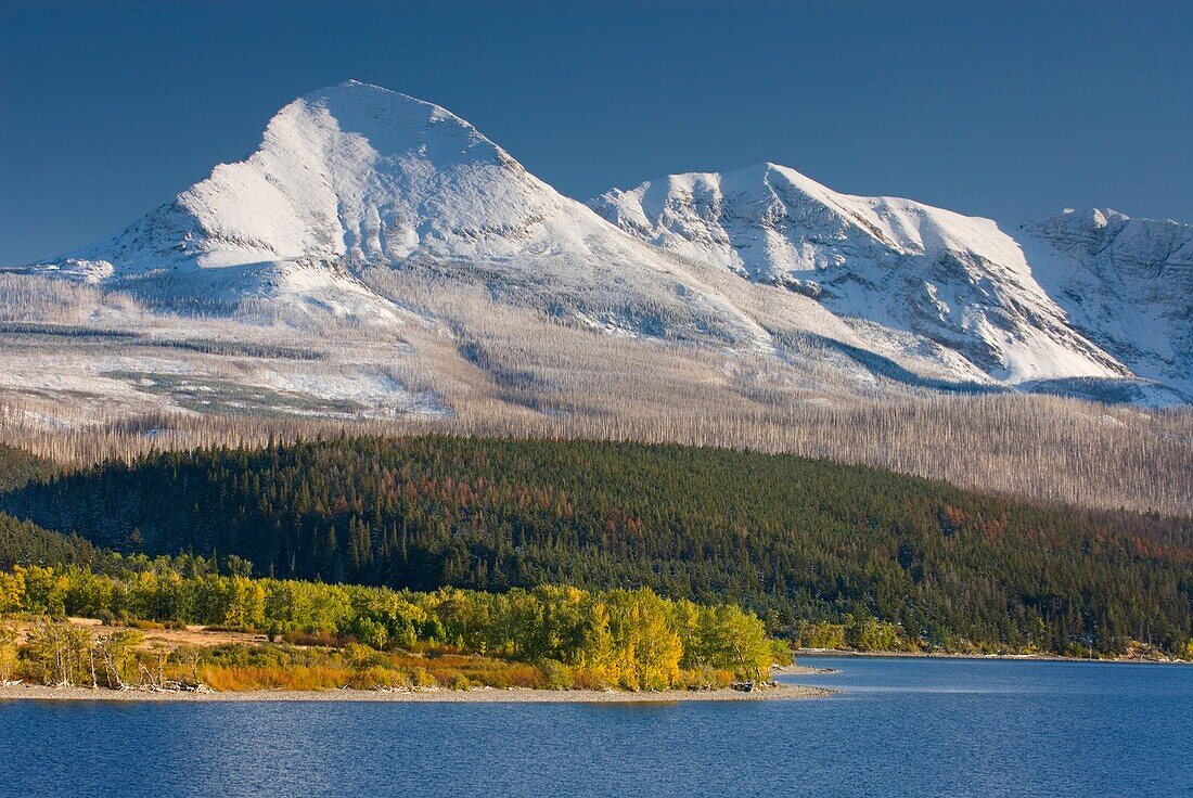 Saint Mary Lake and Divide Mountain after autumn snowstorm, Glacier National Park Montana USA