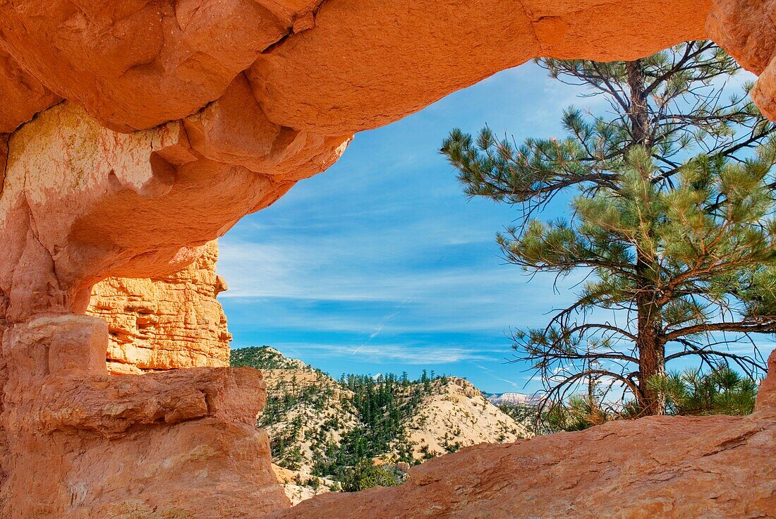 View through Turret Arch in Water Canyon near Mossy Cave, Bryce Canyon National Park Utah