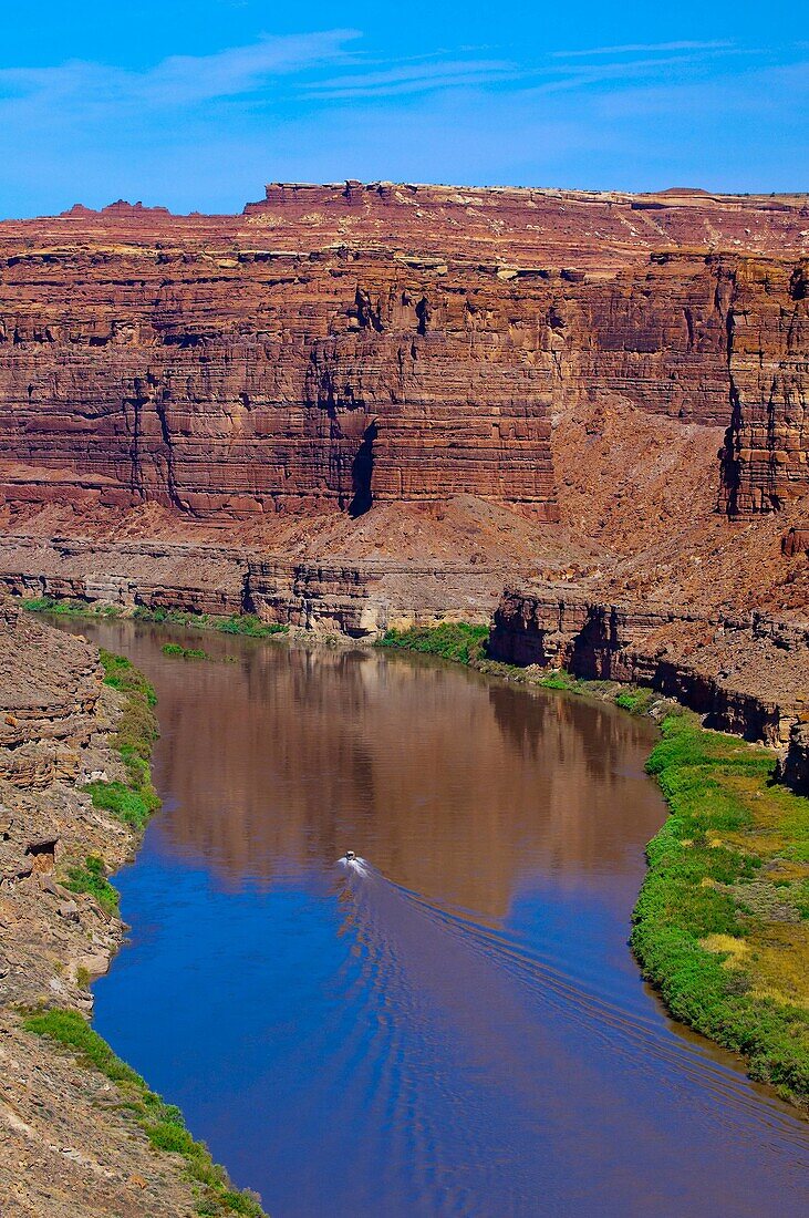 A jet boat going through the Loop, Meander Canyon section of the Colorado River in Canyonlands National Park, Utah, USA