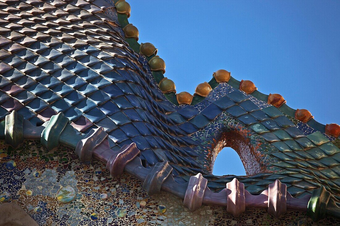 Spain, Cataluna, Barcelona, Eixample, detail of tiles on the roof top of Casa Batlo House of Bones, by the architect Antoni Gaudi