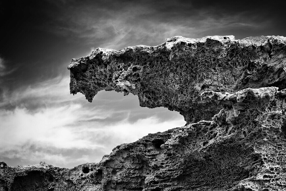 Gargoyle  Rocks eroded by wind, sea water and sand  Playa de Los Escullos, Parque Natural de Cabo de Gata, Almería, Spain, Europe