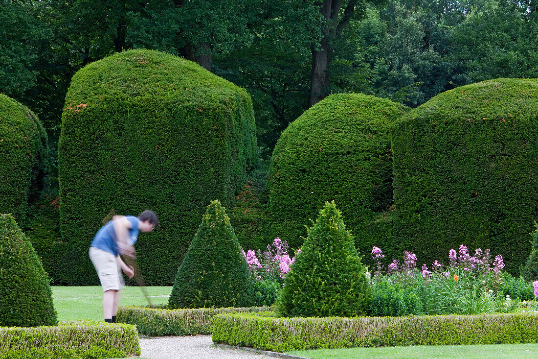 Trimmed hedges in the castle grounds of Clemenswerth Castle in Sögel, Lower Saxony, northern Germany