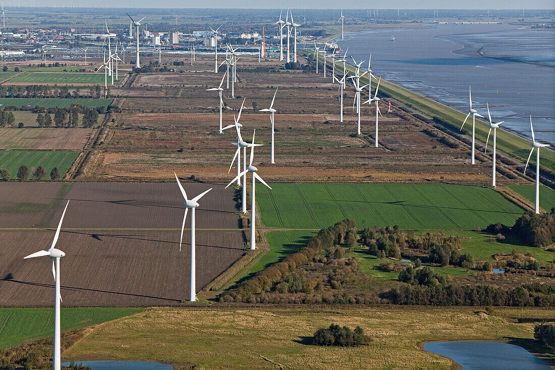 Aerial photo of a wind farm along the North Sea coast, farmland and Ems estuary, Emden, Lower Saxony, northern Germany