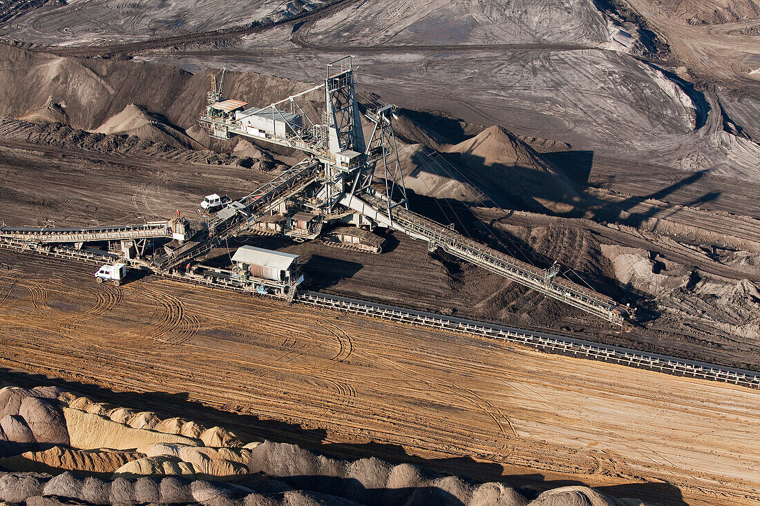 Aerial view of a bucket-wheel excavator with conveyor belt in for open-pit lignite mining, brown coal, Schöningen, Lower Saxony, Germany