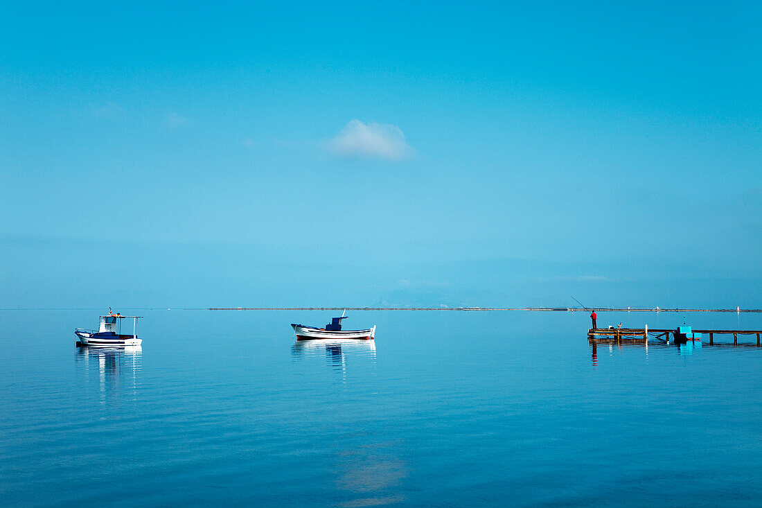 Boats in calm sea, Marsala, Sicily, Italy