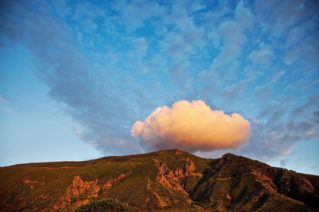 Cloud on top of mountain, Malfa, Salina Island, Aeolian islands, Sicily, Italy