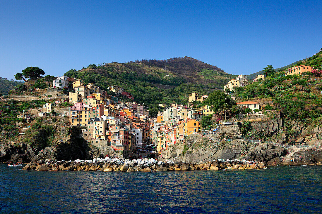 View from the sea to Riomaggiore, boat trip along the coastline, Cinque Terre, Liguria, Italian Riviera, Italy, Europe