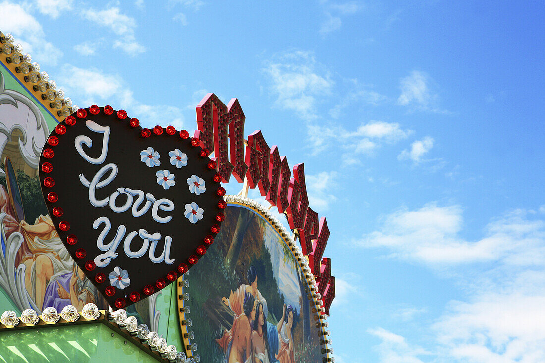 Leuchtreklame von einem Süsswarenstand, Oktoberfest, München, Bayern, Deutschland