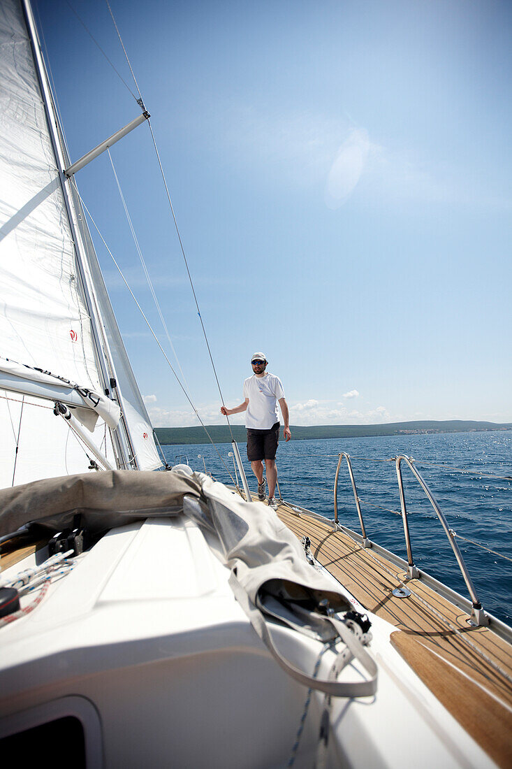Sailor on a sailingboat, Kornati archipelago, Croatia, Europe