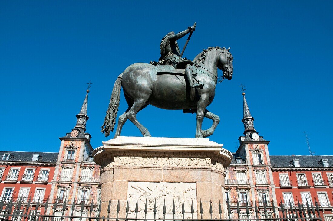 Felipe III statue and Casa de la Panadería, Plaza Mayor. Madrid, Spain