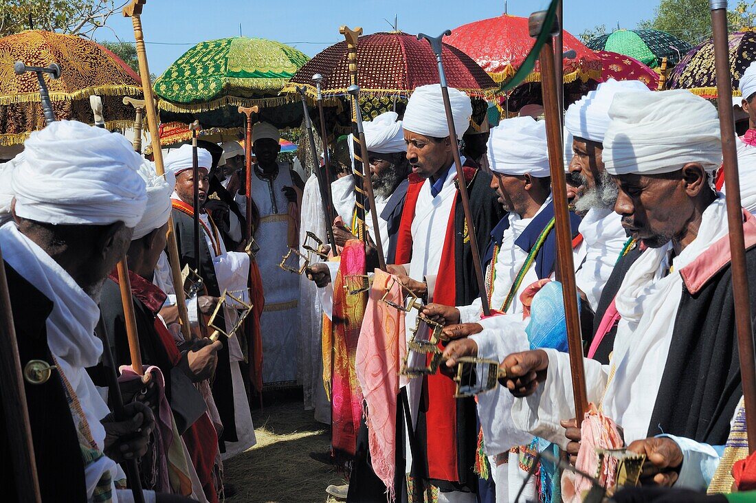 Ethiopia, Lalibela,Timkat festival, Ritual dance of the Dabtaras choristers  Every year on january 19, Timkat marks the Ethiopian Orthodox celebration of the Epiphany  The festival reenacts the baptism of Jesus in the Jordan River  Wrapped in rich cloth