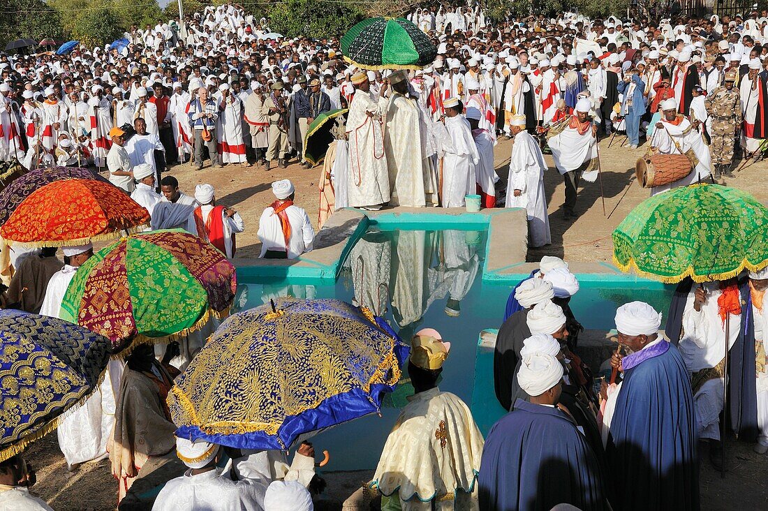 Ethiopia, Lalibela,Timkat festival, Baptism ceremony   Every year on january 19, Timkat marks the Ethiopian Orthodox celebration of the Epiphany  The festival reenacts the baptism of Jesus in the Jordan River  Wrapped in rich cloth, the church Tabots repl