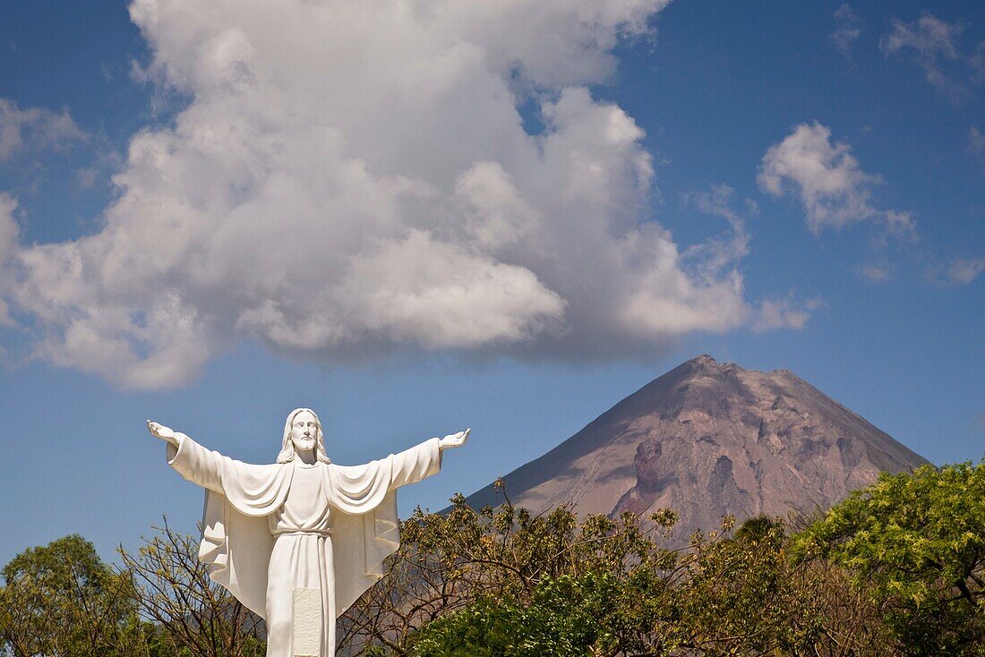 Statue of Jesus in front of Concepcion Volcano on Ometepe Island, Nicaragua