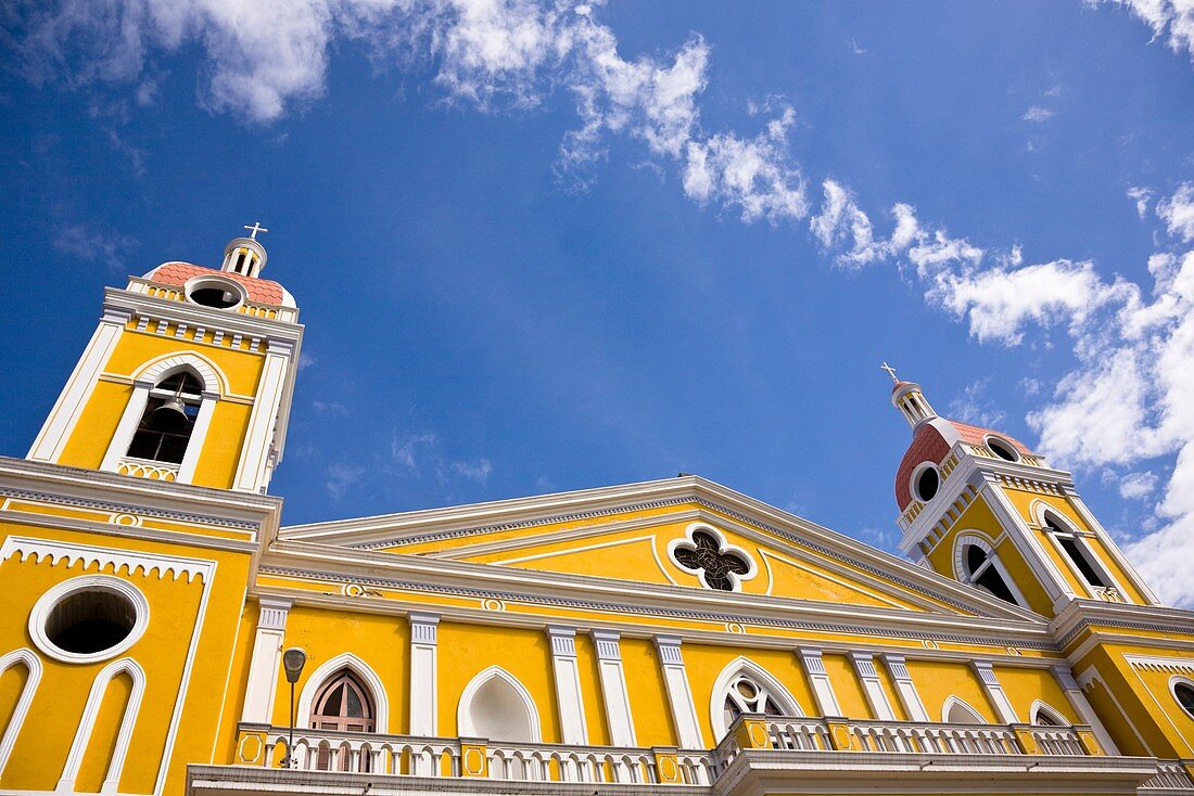 Facade of yellow neoclassical style Cathedral of Granada, Nicaragua