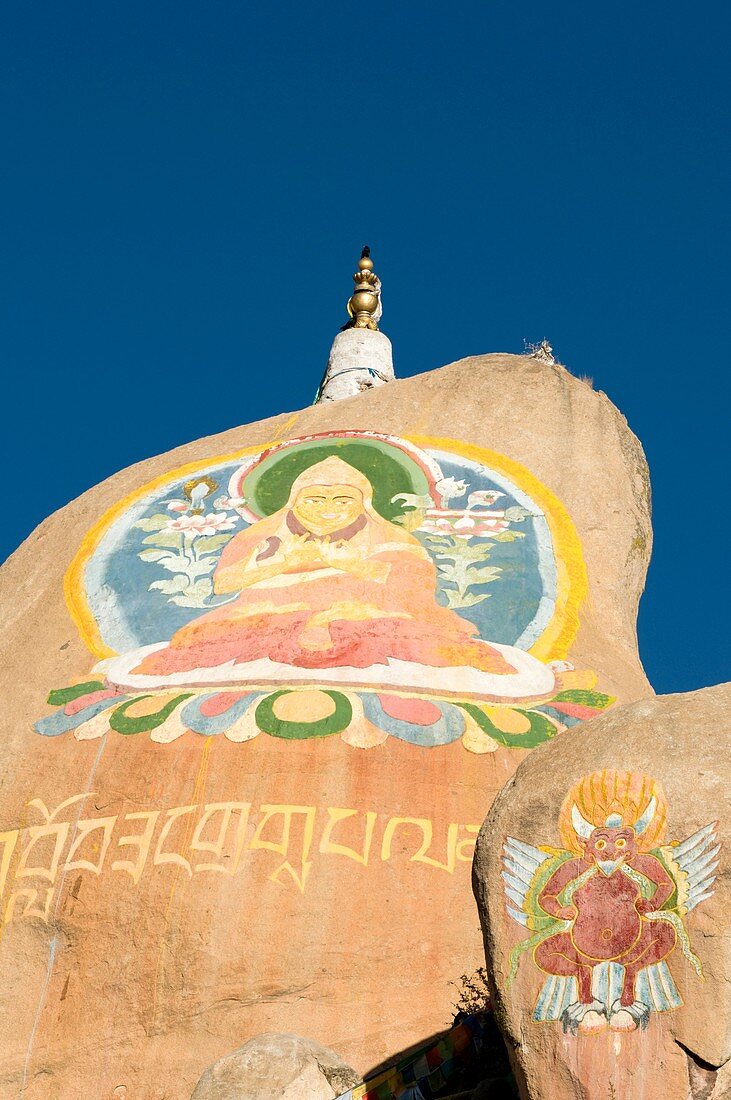 Painted rocks and rock carvings at Drepung Monastery, Tibet