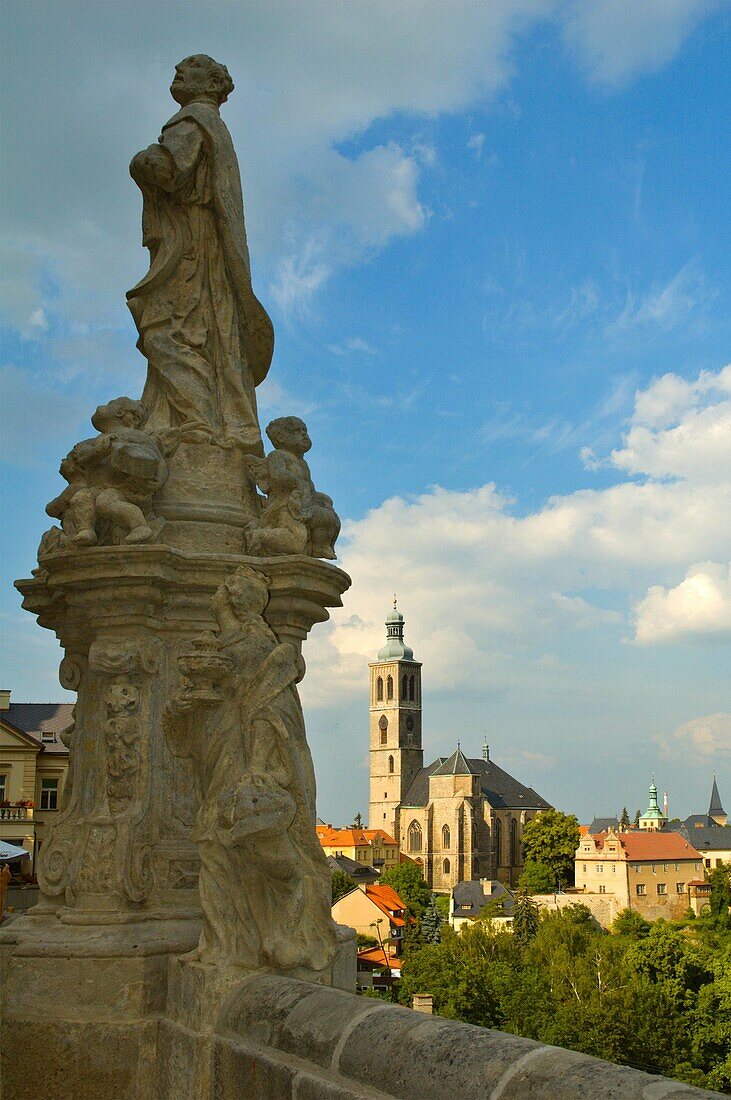 Statue and the church of Saint James in Kutna Hora Czech Republic EU