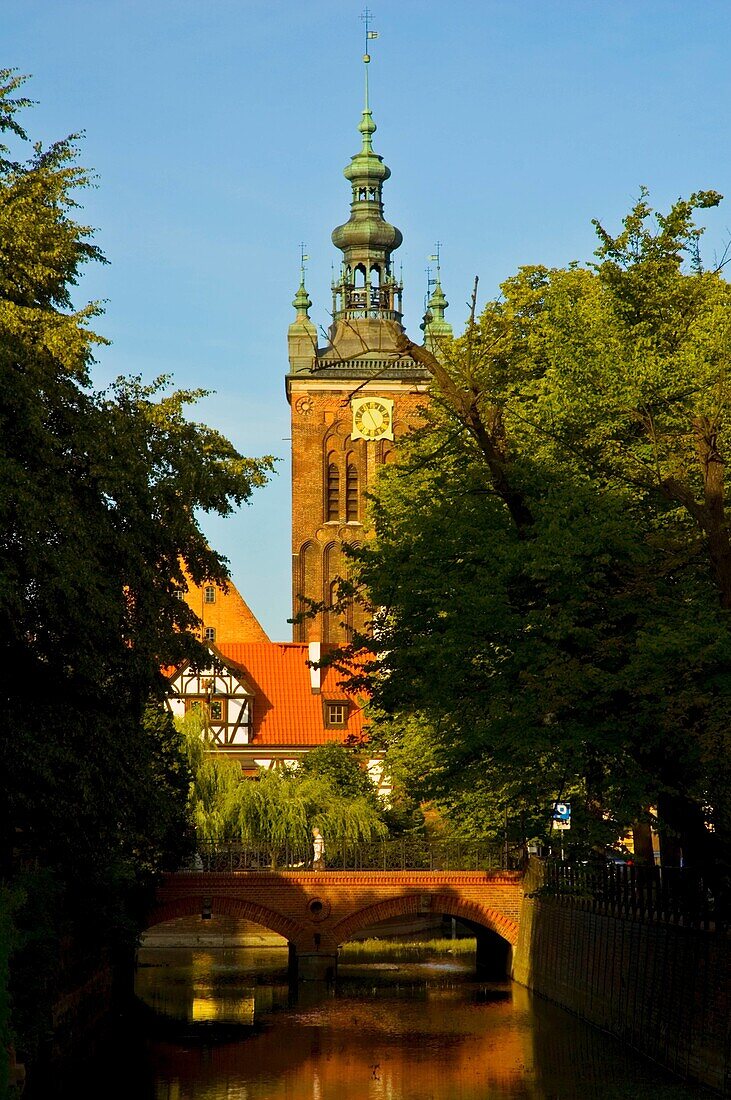 Canals and tower of Saint Catherines church in central Gdansk Poland EU