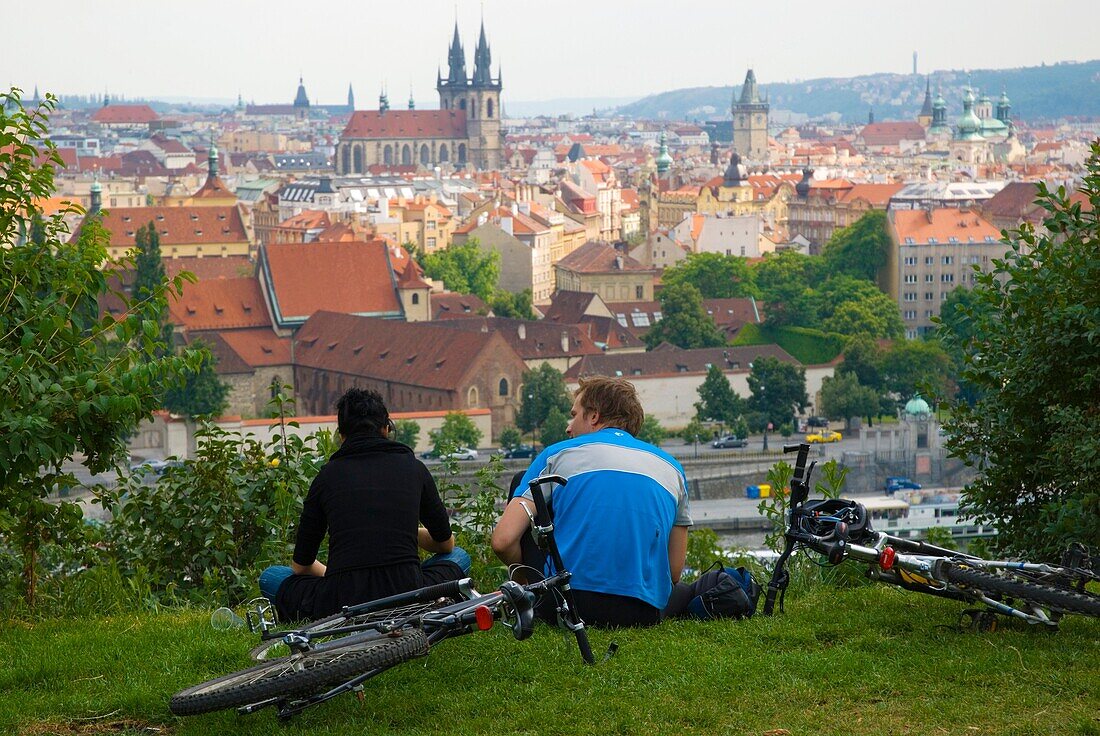 Couple in Letna Park with the city centre of Prague in the background in Czech Republic Europe
