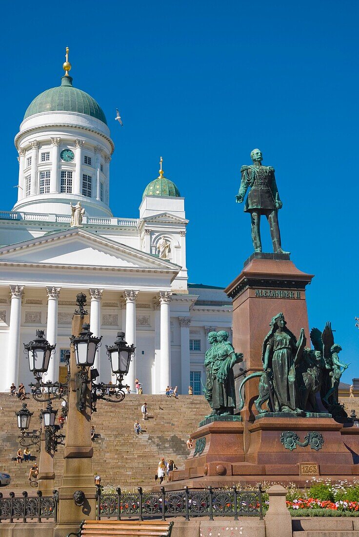 Tuomiokirkko cathedral and statue of Alexander the Second at Senaatintori square in Helsinki Finland Europe