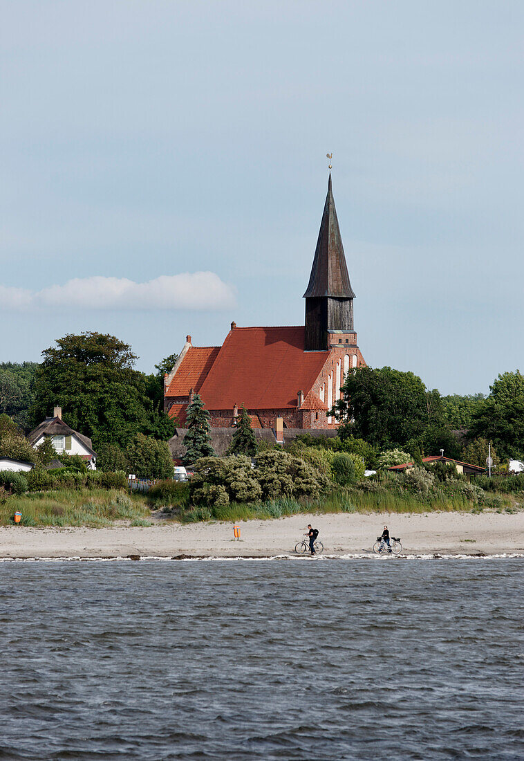 View at beach and church of Schaprode, Schaproder Bodden, Ruegen, Mecklenburg-Western Pomerania, Germany, Europe
