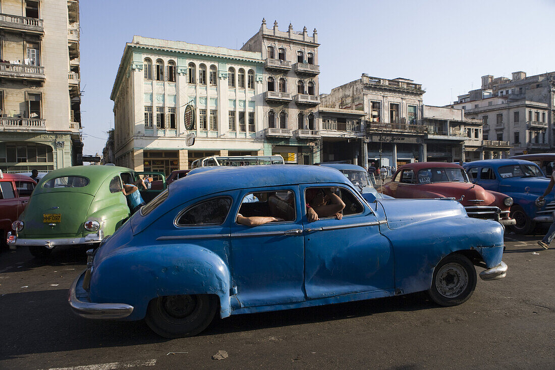 Vintage American cars drive as taxis, Havana, Cuba