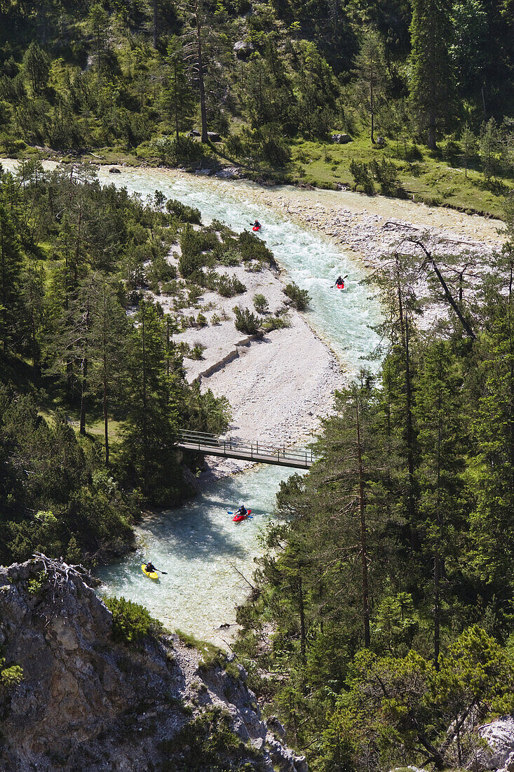 Kayaking on upper reaches of Isar river, Hinterau valley, Karwendel range, Tyrol, Austria
