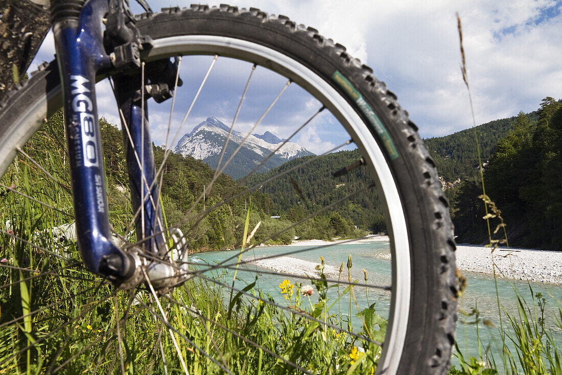 Bicycle near river Isar, Isar Cycle Route, Hinterau Valley, Karwendel range, Tyrol, Austria