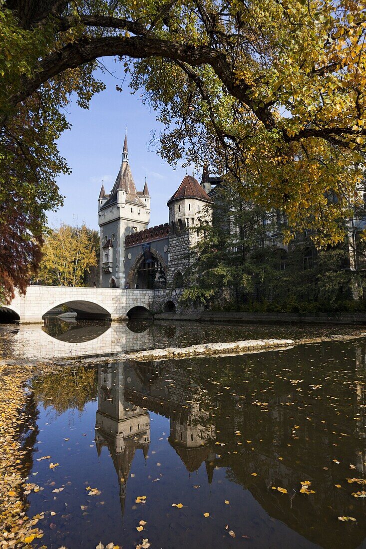 Vajdahunyad Castle in Budapest during fall  The Castle was finished in 1896 and is a blend of different architectural styles and epochs of Hungary  Architect and master-builder was Ignac Alpar  Big parts of the building have been buildt having the castle