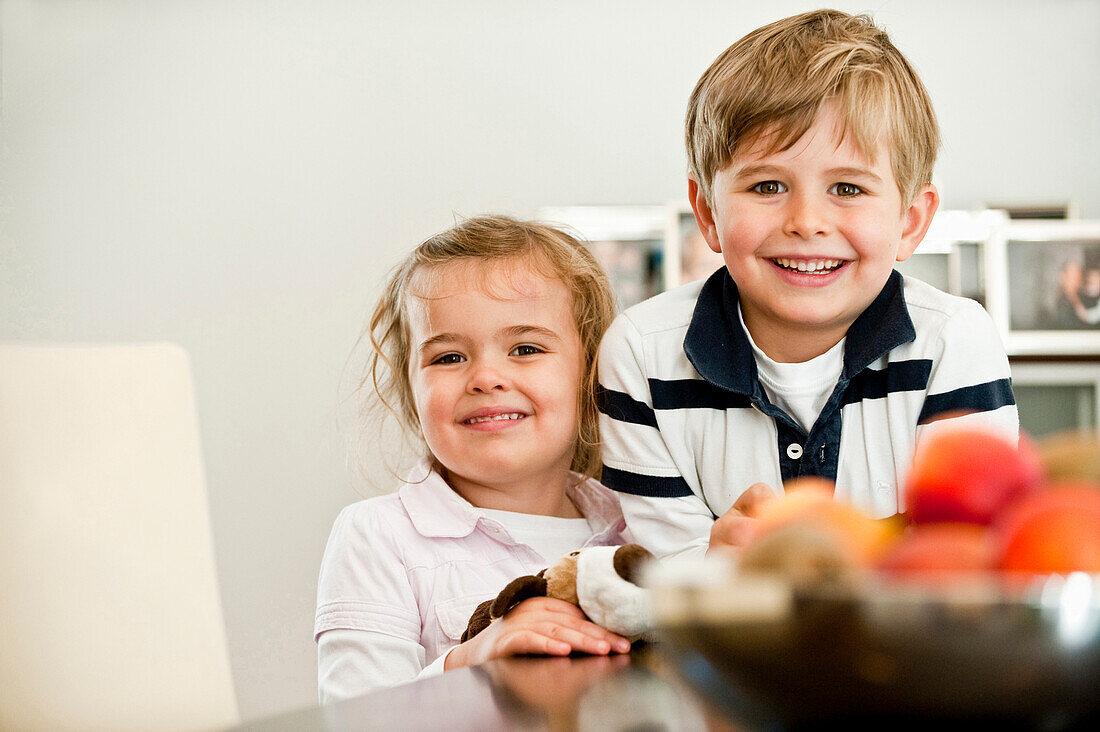 Two children smiling at camera, Hamburg, Germany