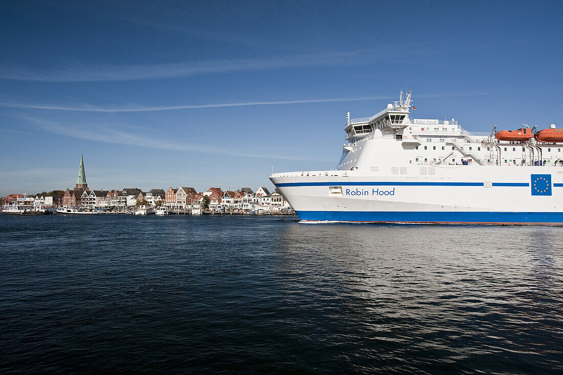 Ferry in harbor, old town in background, Travemunde, Lubeck, Schleswig-Holstein, Germany