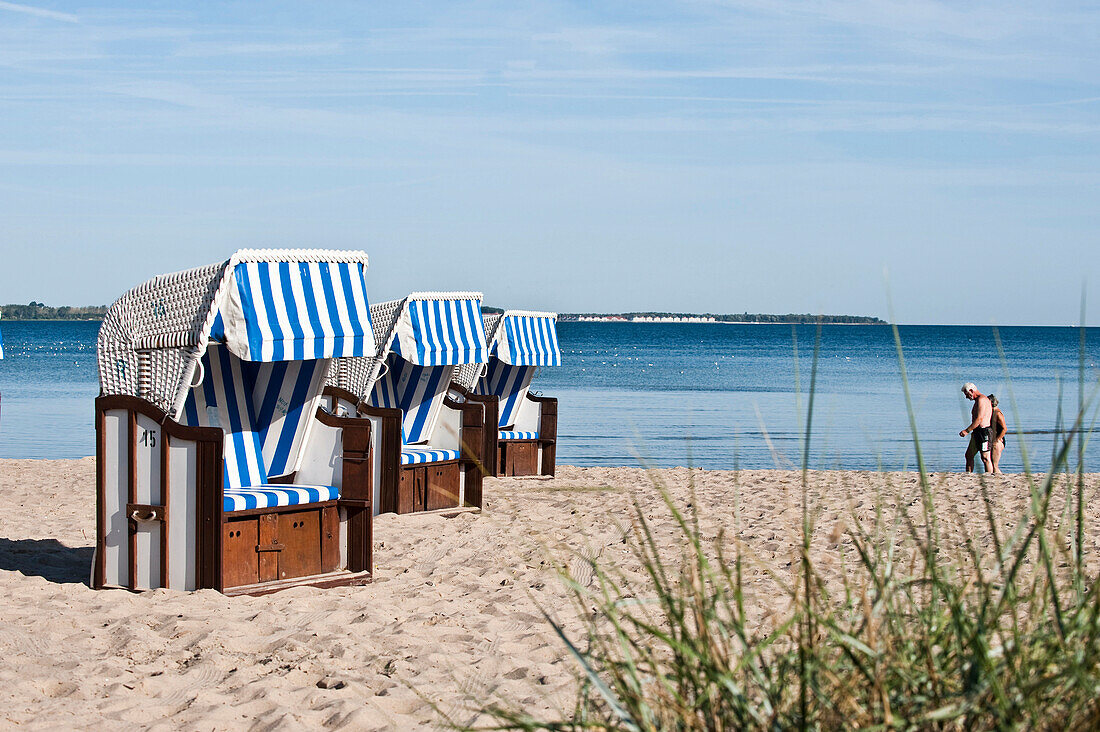 Roofed wicker beach chair at beach of Wohlenberg, Boltenhagen, Bay of Mecklenburg, Mecklenburg-Vorpommern, Germany