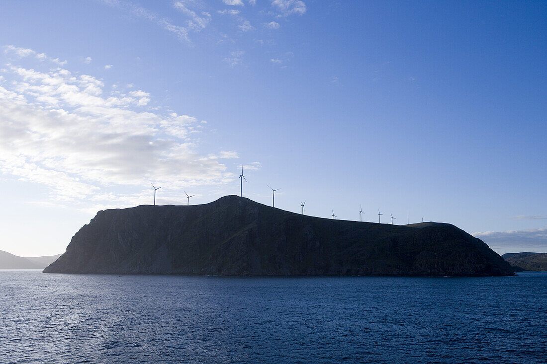 Silhouette of Wind Wheels on Hillside, near North Cape, Finnmark, Norway, Europe