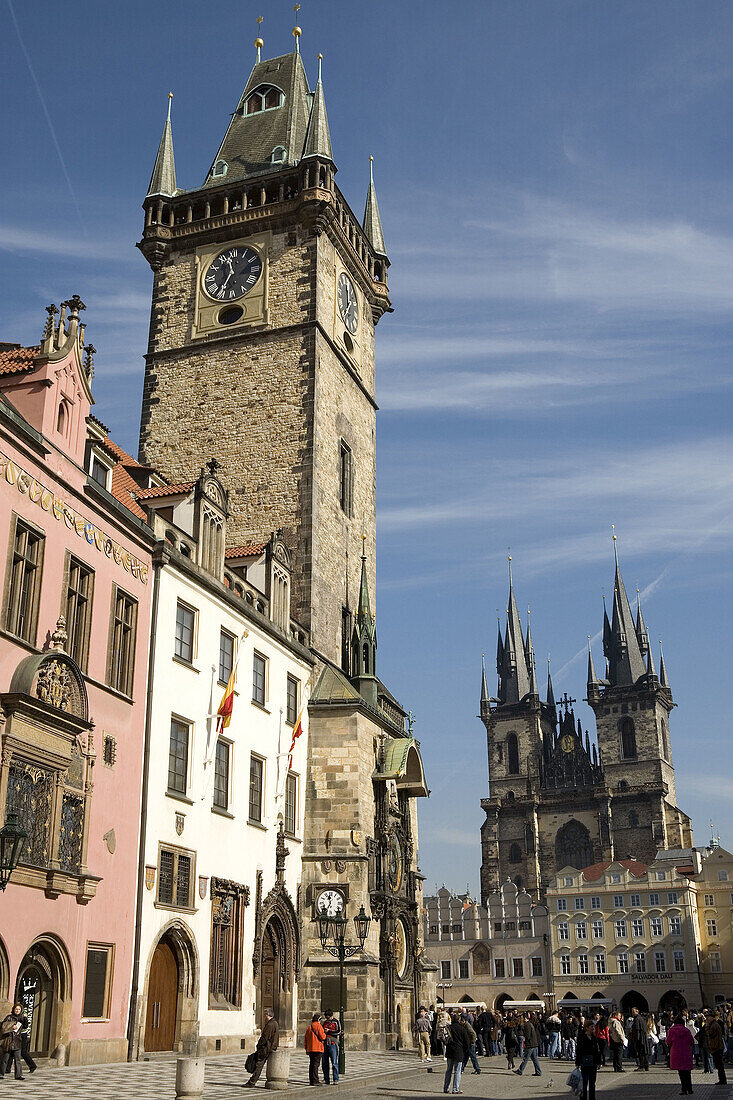 Czech Republic. Prague. Old Town Square. Old town hall tower and astronomical clock. St. Nicholas Church in the backround.
