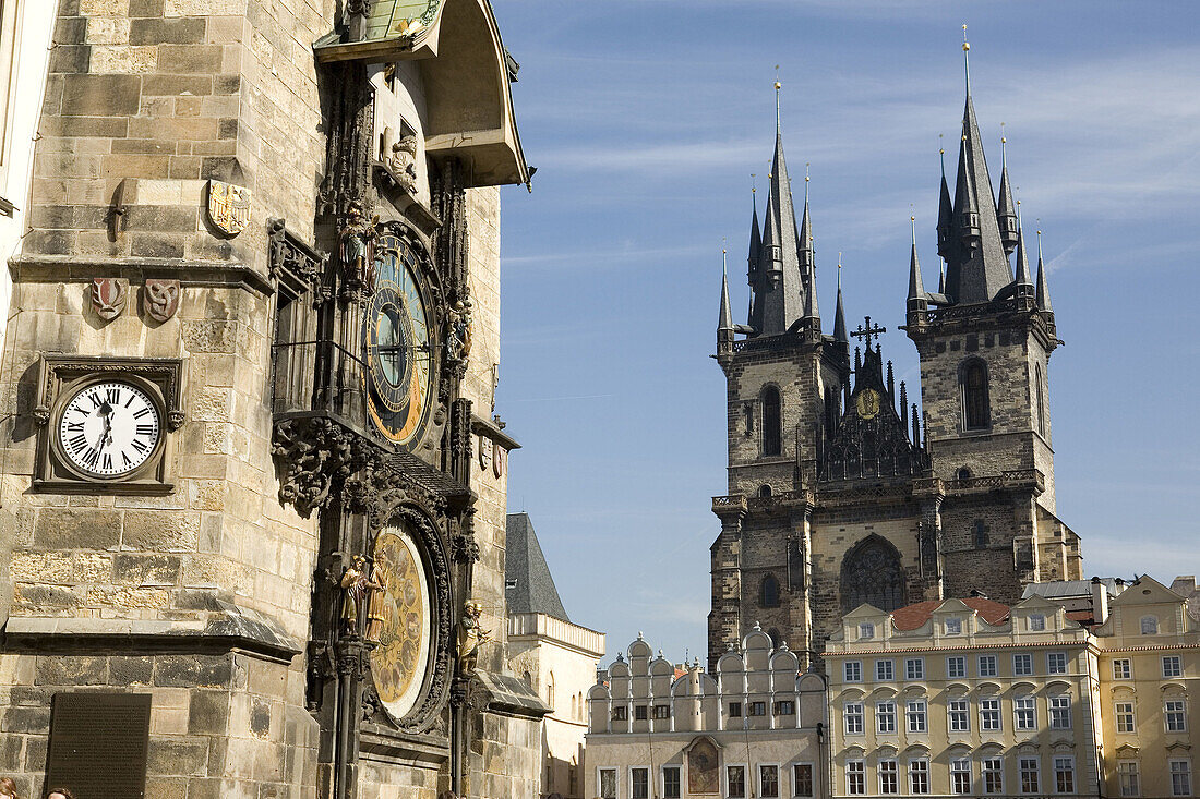 Czech republic. Prague. Old Town Square. Old town hall tower and astronomical clock. St. Nicholas Church, in the backround.