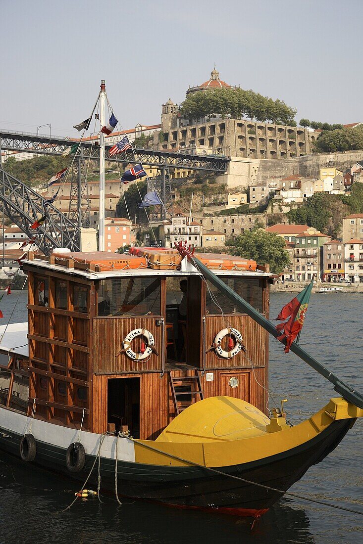 Wine Barges on Douro River with the City behind at Dusk, Porto, Portugal