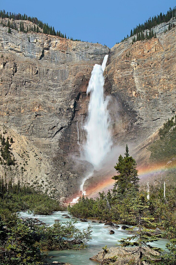 Takakkaw Falls in British Columbia with rainbow at base