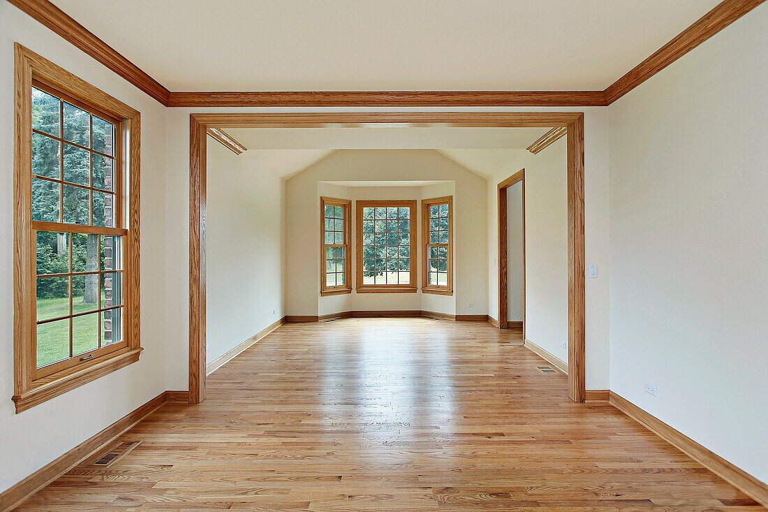 Dining room in new construction home with wood trim