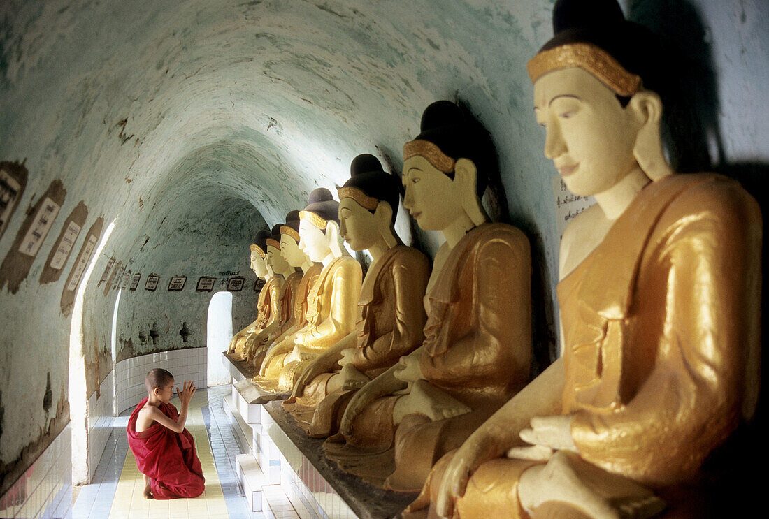 Myanmar  Burma), Bago, Shwegugale Pagoda, praying young monk