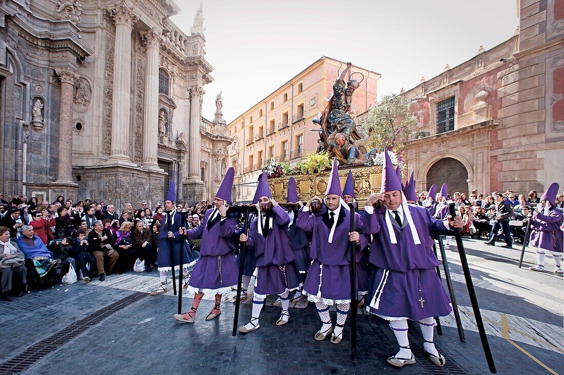 Good Friday procession with float by Baroque sculptor Francisco Salzillo passing by cathedral, Murcia, Spain