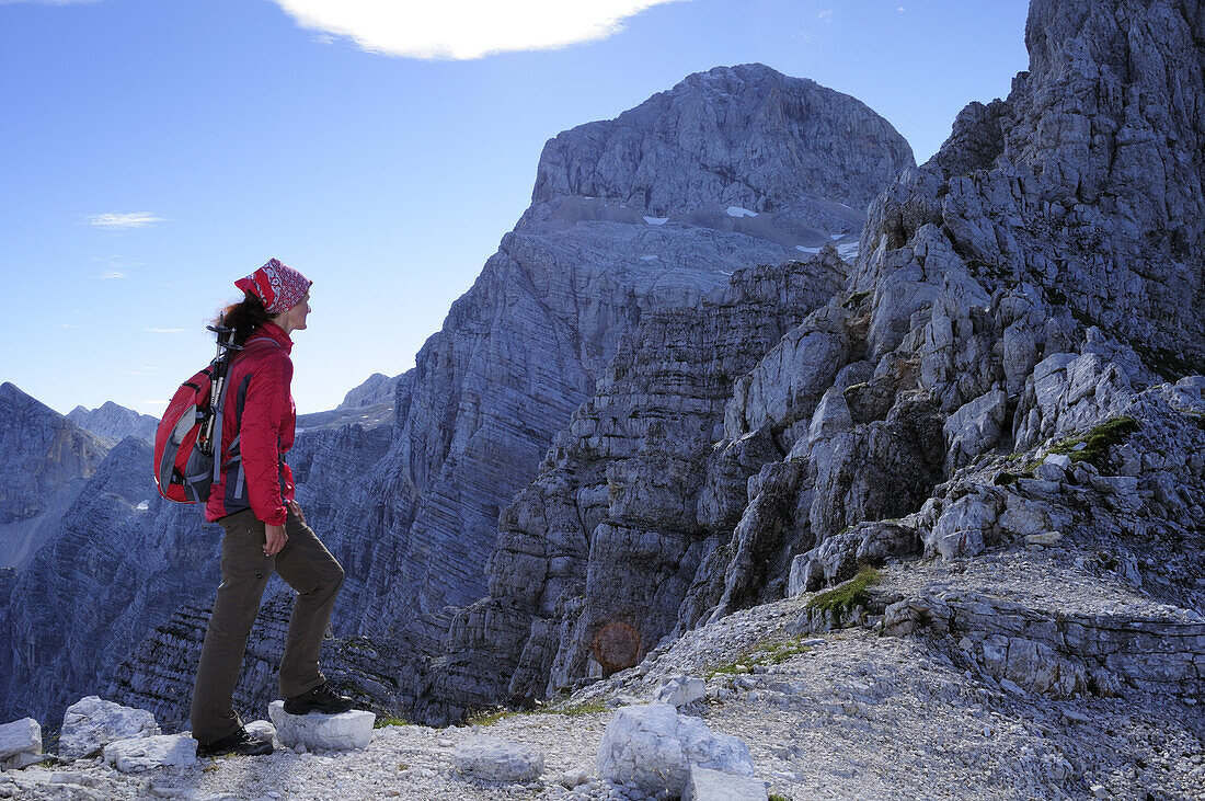 Woman looking to Triglav, Vrata valley, Triglav National Park, Julian Alps, Slovenia